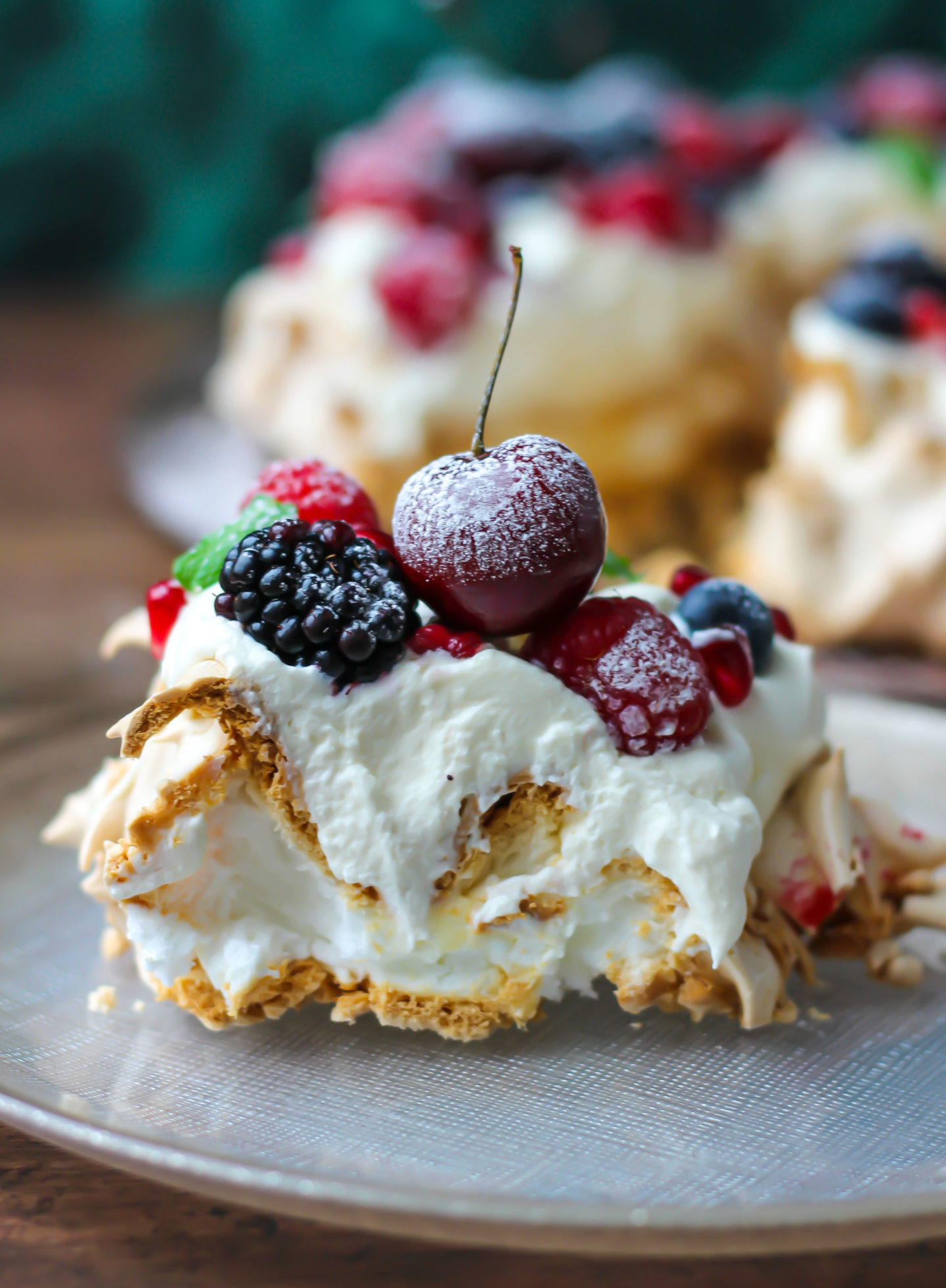 slice pavlova with a cherry on top