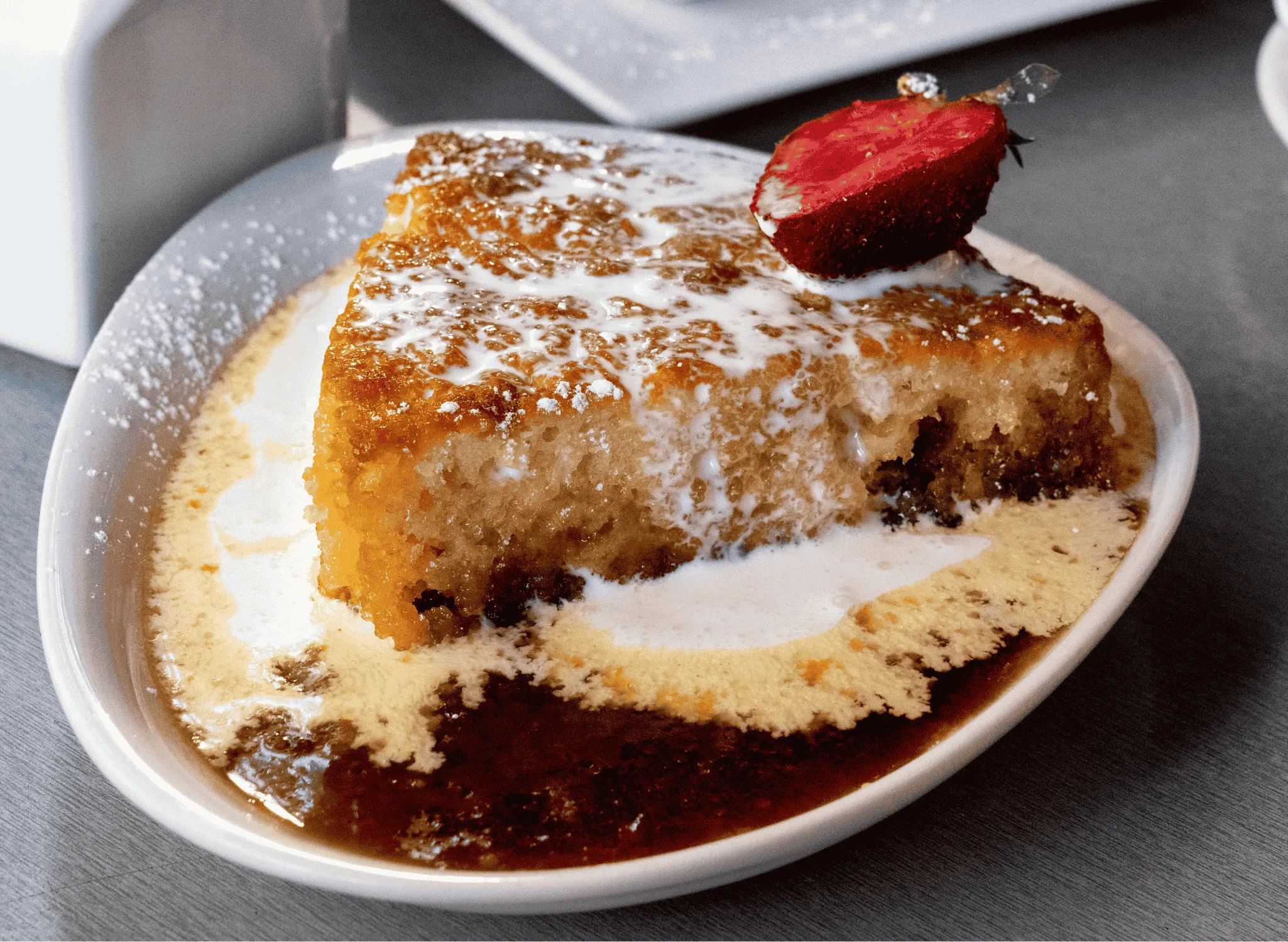 chomeur slice with a strawberry on top